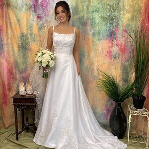 πEden Bridals Elegant Bridal Gown train brocaded